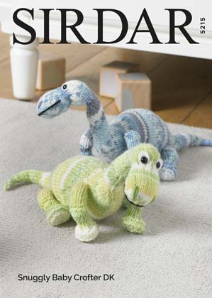 Sirdar 5215 Dinosaur. Uses #3(double knitting) weight yarn. Model is knit in Sirdar Snuggly Crofter DK.